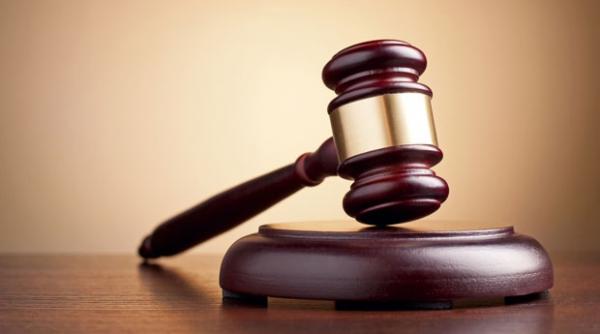 doi fosti agenti ai serviciilor secrete franceze inculpati pentru furnizarea de informatii unei puteri straine