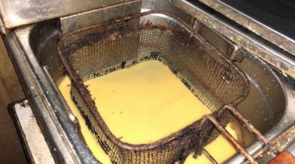 mizerie crunta intr un subsol unde se prepara mancare pentru elevi