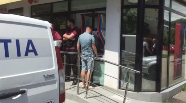 perchezitii la suspectii care au pus la cale un jaf armat de la o banca din baia mare