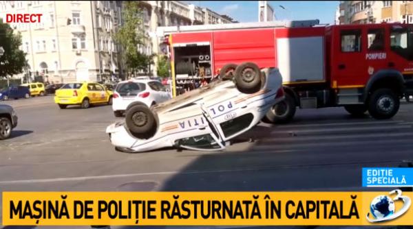 masina de politie rasturnata in capitala