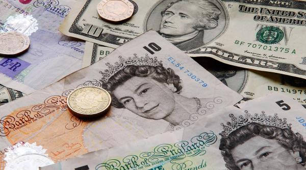 lira sterlina se prabuseste la cea mai slaba cotatie fata de dolar din 1985