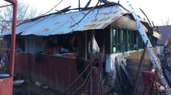 femeie moarta casa incendiu