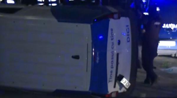 masina digi a fost rasturnata de protestatari in fata bec