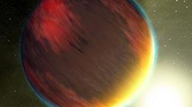 vapori de apa si poate chiar furtuni in atmosfera unei planete extrasolare