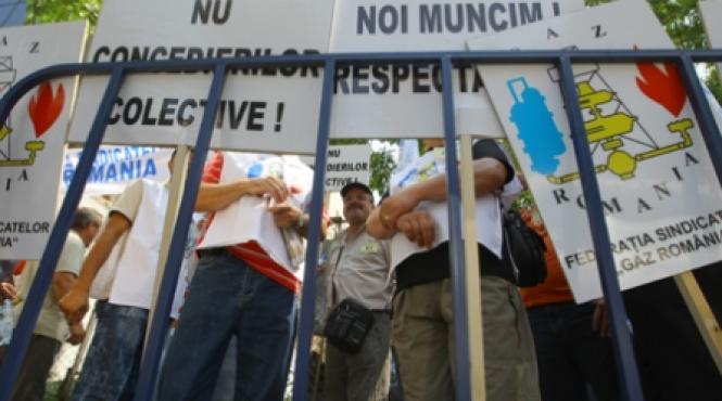 proteste pe concedieri colective la e on