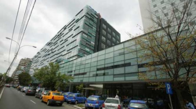 o cladire de birouri din trei polueaza degeaba