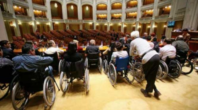 guvernul taie banii handicapatilor