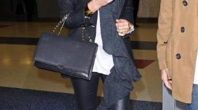 victoria beckham poarta la ea fotografia lui david dezbracat