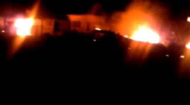 noi imagini cu vila lui osama bin laden in flacari