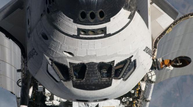 nasa a publicat in premiera imagini cu o naveta americana andocata la iss