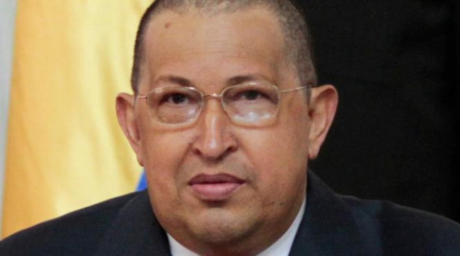 hugo chavez a aparut cu capul ras la o sedinta de guvern