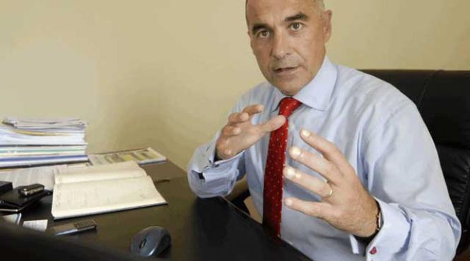 tehnocratul lui basescu il desfiinteaza pe boc ca sa salvam bugetul am omorat economia