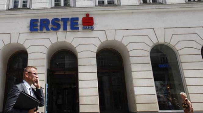 erste face pasul decisiv pentru preluarea integrala a bcr si amana din nou listarea bancii