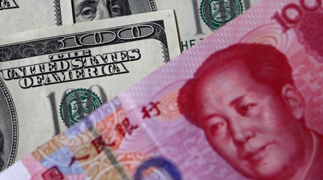 sua critica din nou china pentru politica sistemului valutar