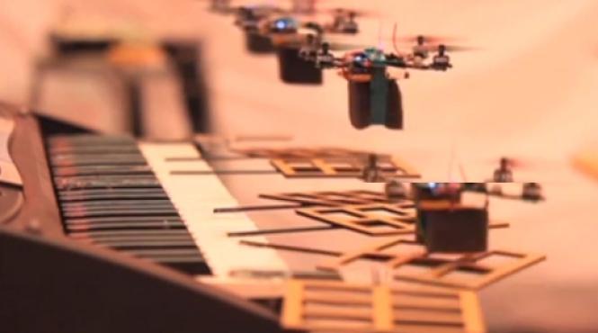 muzica din james bond interpretata de o armata de elicoptere robot video