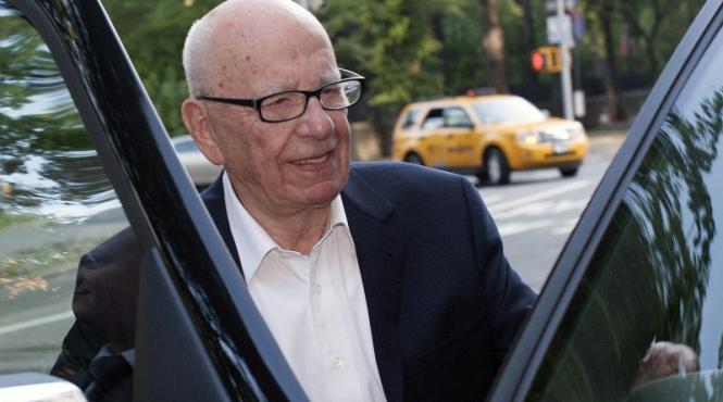rupert murdoch demisioneaza de la conducerea news international group ltd