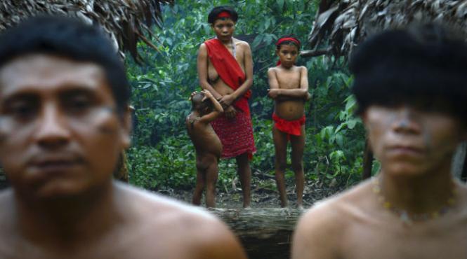 un trib din sudul braziliei ameninta ca se sinucide daca nu vor ramane pe teritoriul lor