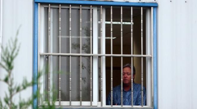 un american este tinut ostatic de sase zile de angajatii sai din china care vor sa fie concediati