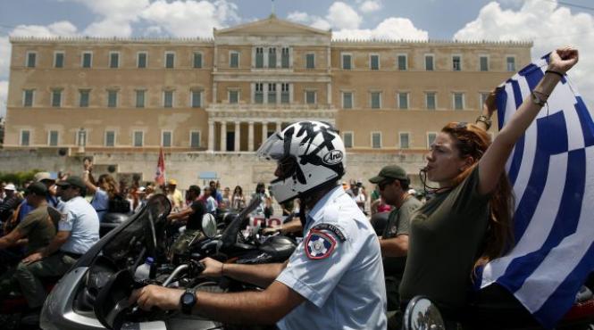 parlamentul grec a aprobat planul de reforma a functiei publice si fiscalitatii pentru a debloca o noua transa din imprumut