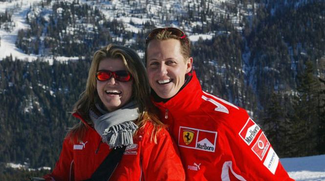 bild schumacher comunica din priviri cu sotia lui corinna dar si cu medicii