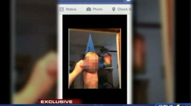 si a atarnat baietelul de 14 luni intr un carlig apoi l a fotografiat imaginea a creat isterie pe facebook video