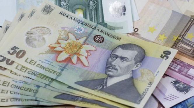 leul s a depreciat fata de dolar cu 14 in acest an efectele se vad din aprilie