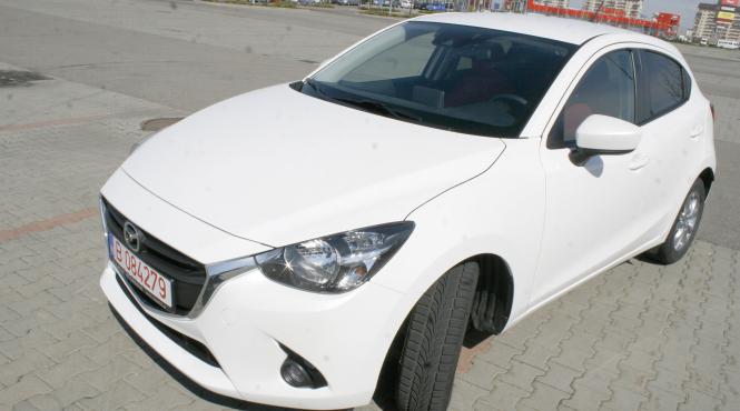 mazda 2 mica dar cam scumpa