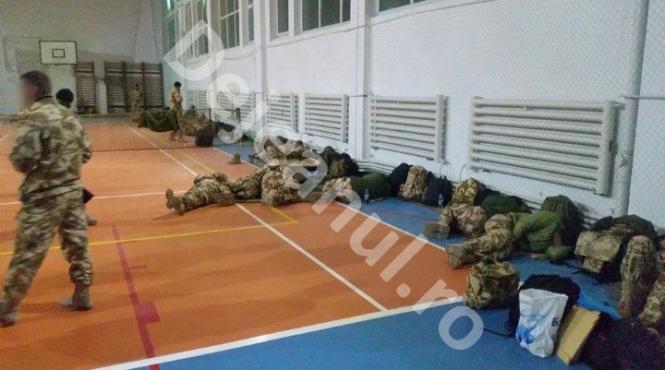 militarii din batalionul dragonii transilvani umiliti la intoarcerea dintr o misiune din afganistan