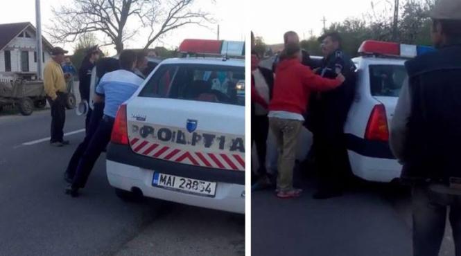 scandal de proportii in plina strada doi politisti erau sa fie linsati de rudele unui barbat pe care l au incatusat