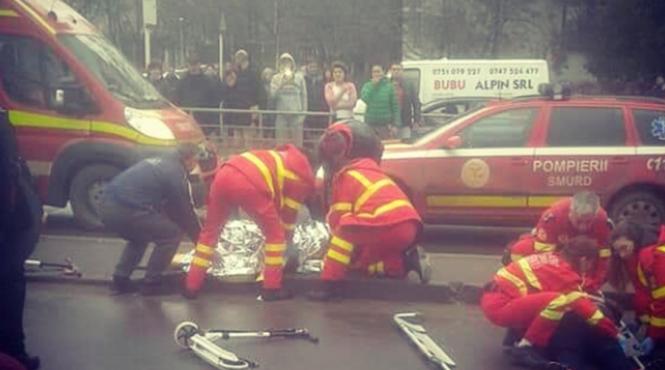 o femeie si doi copii loviti de o masina pe trecerea de pietoni