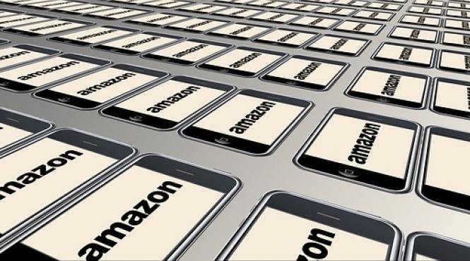 actiunile amazon depasesc pentru prima data pragul de 1 500 de dolari
