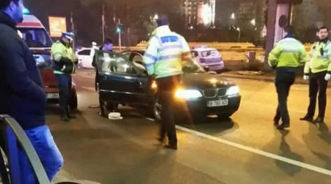 un politist a fost lovit cu masina de un sofer pe care voia sa l sanctioneze pentru ca parcase neregulamentar