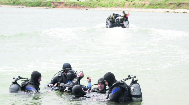 scafandrii militari continua cautarea directorului apia disparut in lacul belis