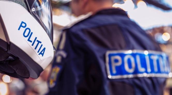 politist lovit cu o piatra in cap si zgariat de un tanar in timpul unei interventii