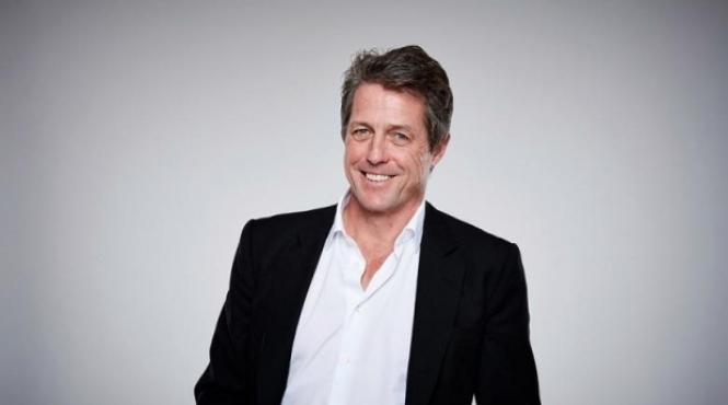 hugh grant s a uns pe fata cu marmelada in scop caritabil