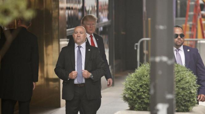 departamentul justitiei vrea clasificarea unor informatii despre perchezitia in resedinta lui donald trump