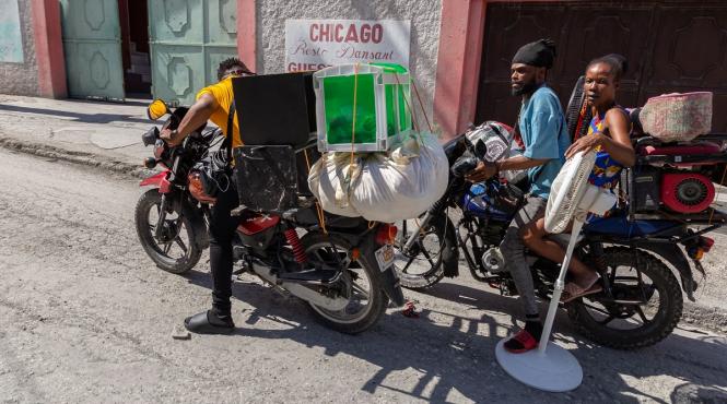 peste 20 000 persoane stramutare violente bande haiti