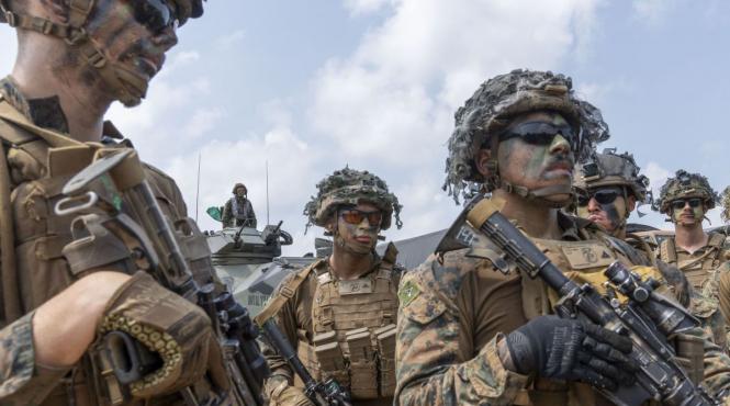 nato trump alianta intelegere decizie retragere trupe americane germania