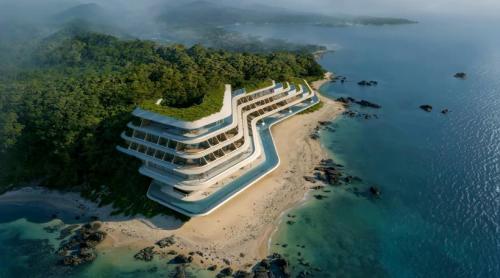 O clădire unică, în zig zag, apare la malul mării, în locul în care oamenii „uită să moară”. Povestea Vertex