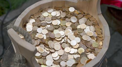 Un bulgar s a dus la bancă cu trei butoaie pline cu monede leva ca să le schimbe în euro