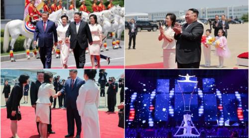 Cai albi, acrobați și mii de copii sărind în sus de bucurie. Cum l au primit Kim Jong Un și soția lui la Phenian pe Xi Jinping