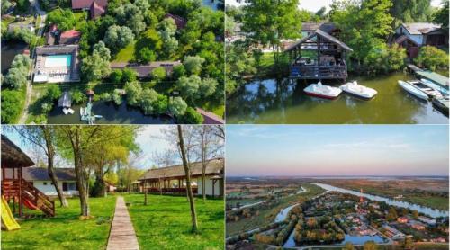 O insulă privată din Delta Dunării se vinde iar prețul tocmai s a prăbușit. Are locuri de cazare, restaurant și piscină