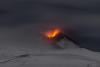 Erupția vulcanului Etna. Lava fierbinte curge pe versanții muntelui 18873006