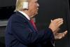 Trump, intrare triumfala cu urechea bandajată la Convenția republicană 18907928
